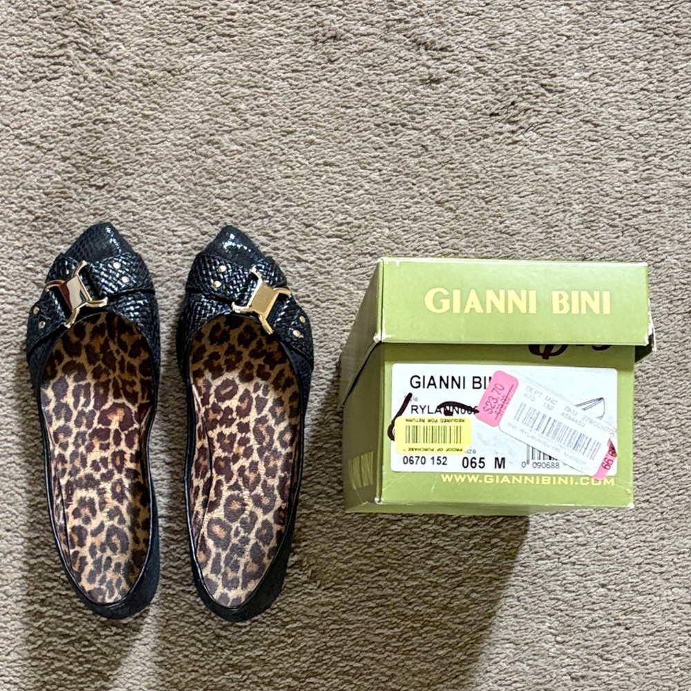 Gianni Bini Black Snake-Texture Ballet Flats with Gold Accent